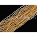 Lustered transparent med topaz 11/0